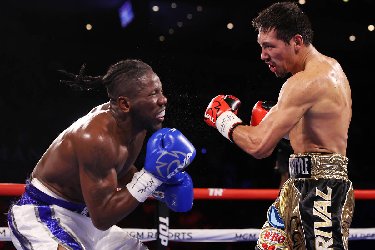 Janibek Alimkhanuly, right, connects a punch against Hassan N’Dam N’Jikam in the ...