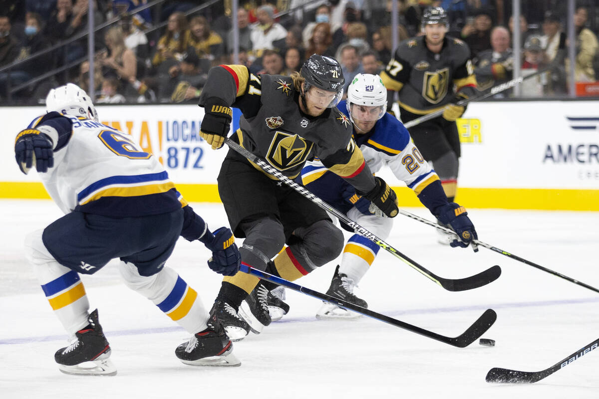 Golden Knights center William Karlsson (71) breaks for the net defended by Blues defenseman Mar ...