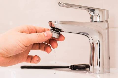 A faucet with low water flow can usually be attributed to a clogged aerator. (Getty Images)