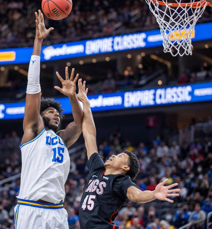 UCLA center Myles Johnson (15) shoots over Gonzaga guard Rasir Bolton (45) during the first hal ...