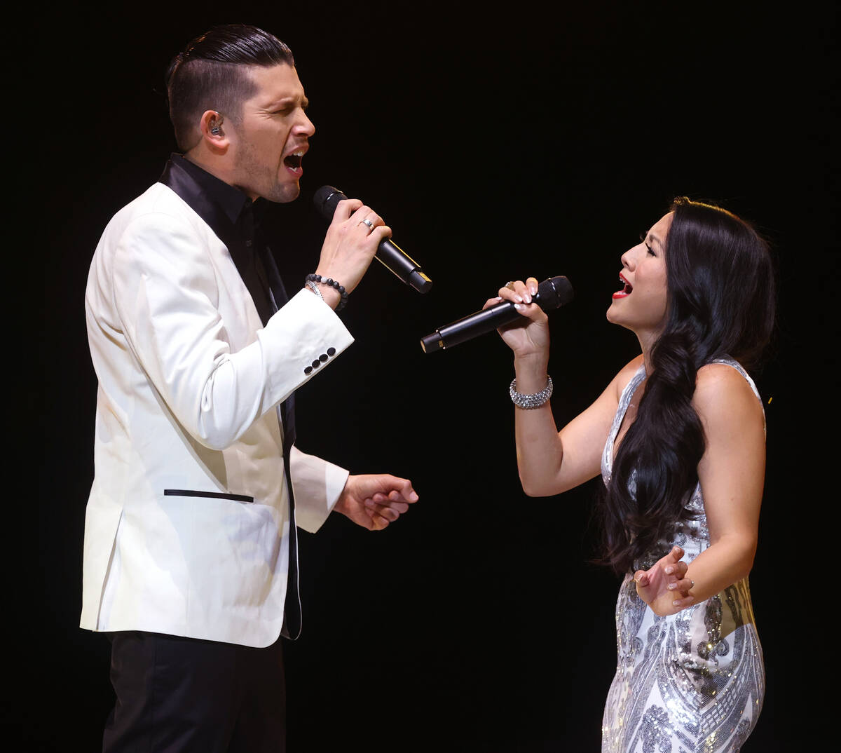 Ben Stone and Jasmine Trias sing "The Prayer" during a preview of "This Is Chris ...