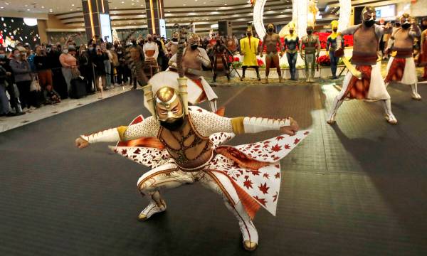 Cirque Du Soleil's KÀ artists perform battle scenes during a pop-up performance in the lobby o ...