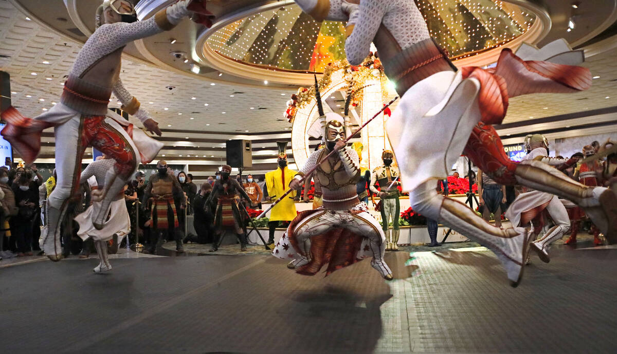 Cirque Du Soleil's KÀ artists perform battle scenes during a pop-up performance in the lob ...