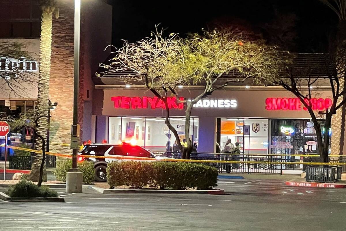 Police investigate a fatal shooting at Teriyaki Madness, at 10300 W Charleston Boulevard, in La ...