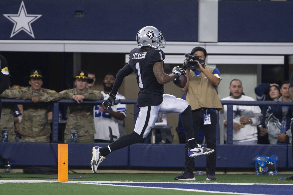 Raiders wide receiver DeSean Jackson (1) runs in for a touchdown during the first quarter of an ...
