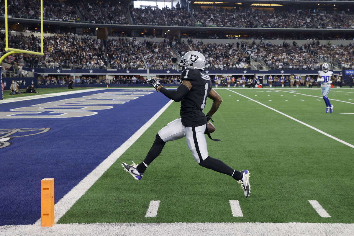 Las Vegas Raiders wide receiver DeSean Jackson sprints to the end zone after catching a pass fo ...