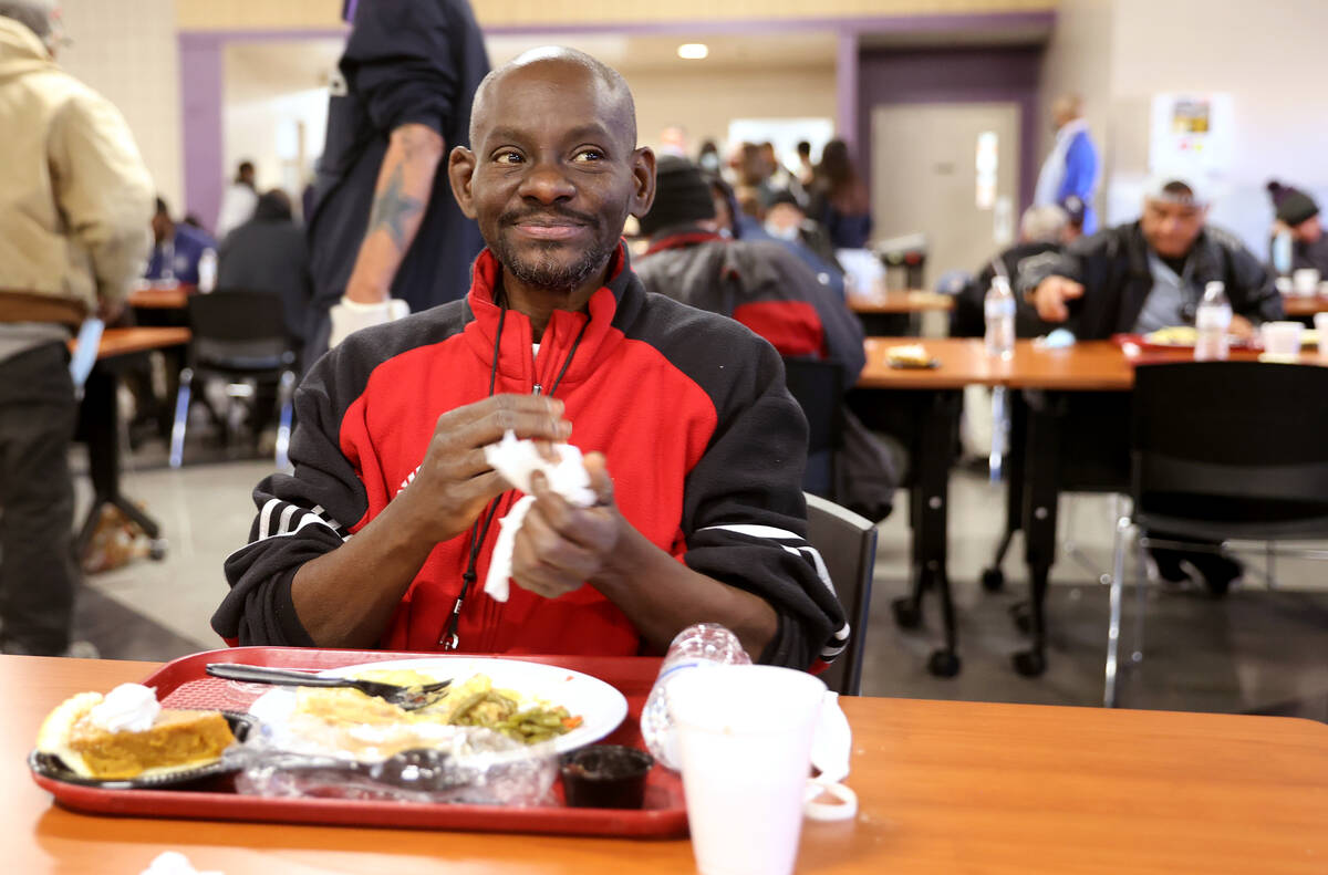 Ken Reed, 50, eats a free Thanksgiving meal in the renovated St. Vincent Lied Dining Facility a ...