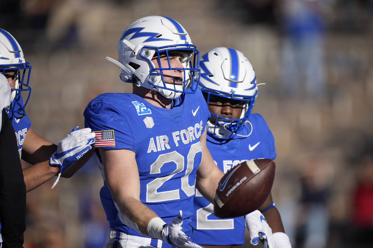Air Force running back Brad Roberts celebrates after rushing for a touchdown against UNLV in th ...