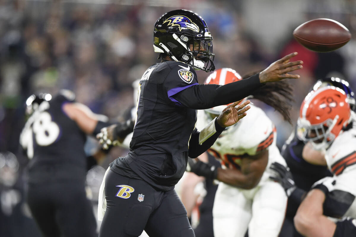 Baltimore Ravens quarterback Lamar Jackson throws a pass against the Cleveland Browns during th ...