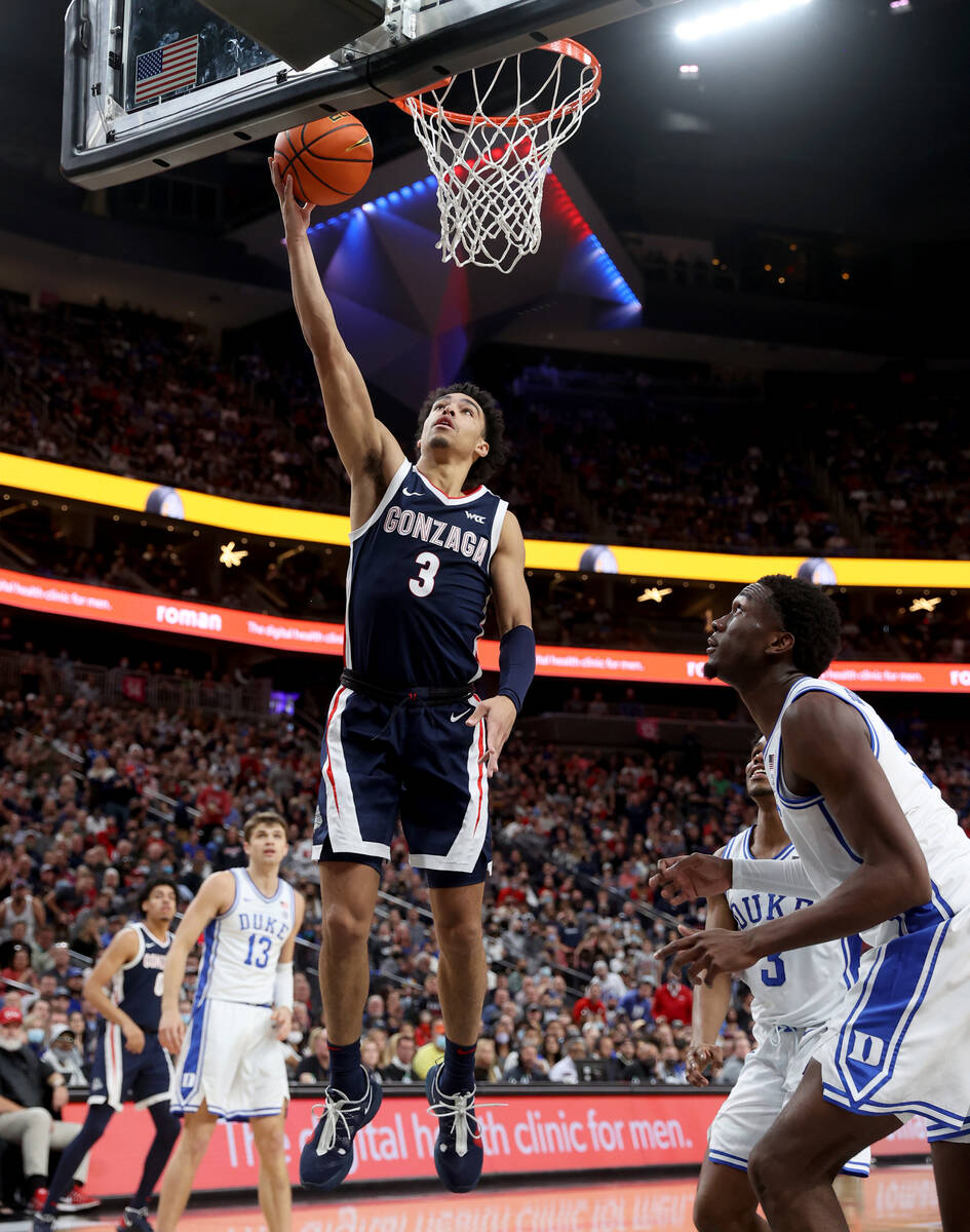 Gonzaga Bulldogs guard Andrew Nembhard (3) lays up against Duke during the first half of an NCA ...