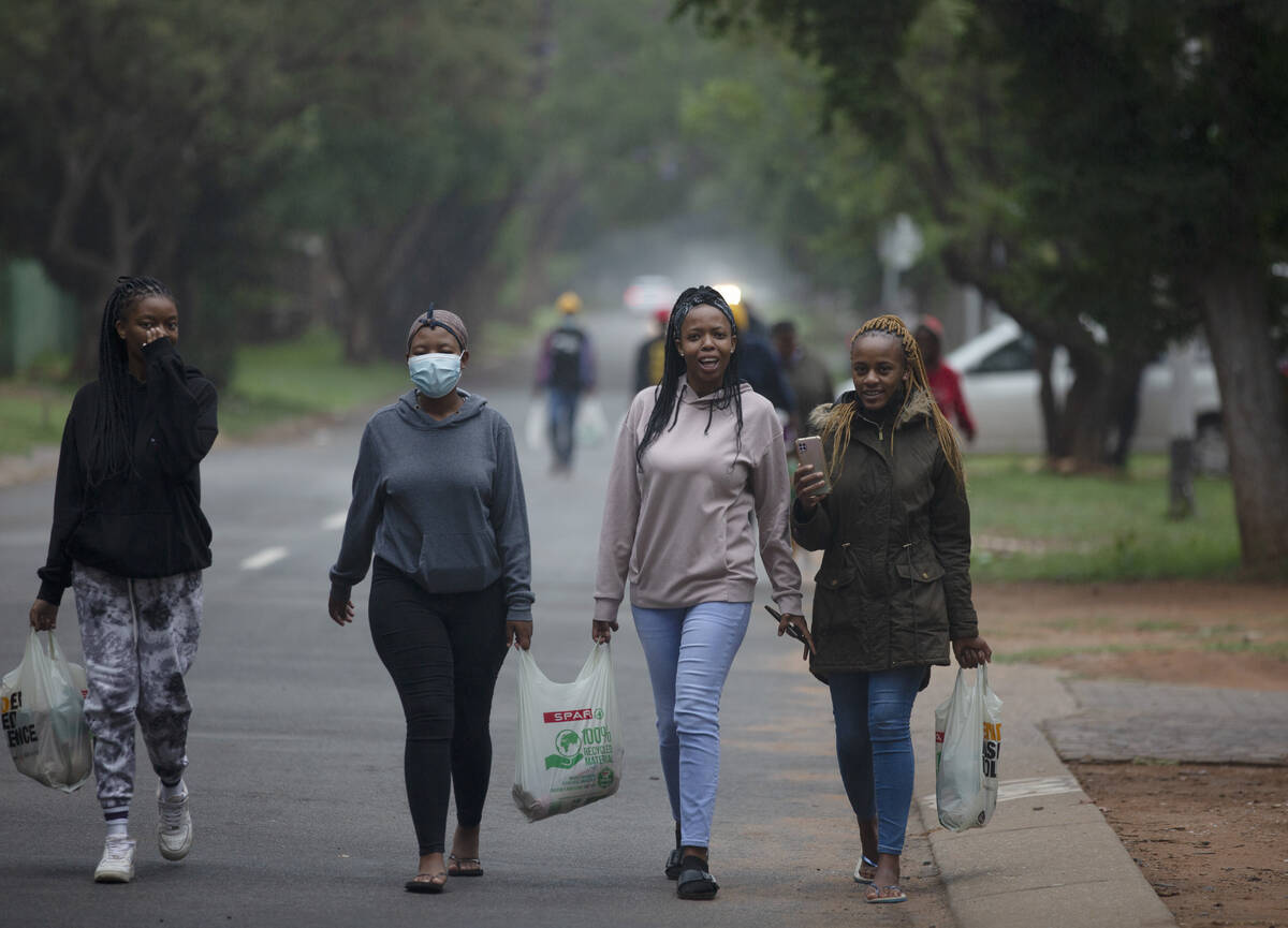 Students from the Tshwane University of Technology make their way back to their residence in Pr ...