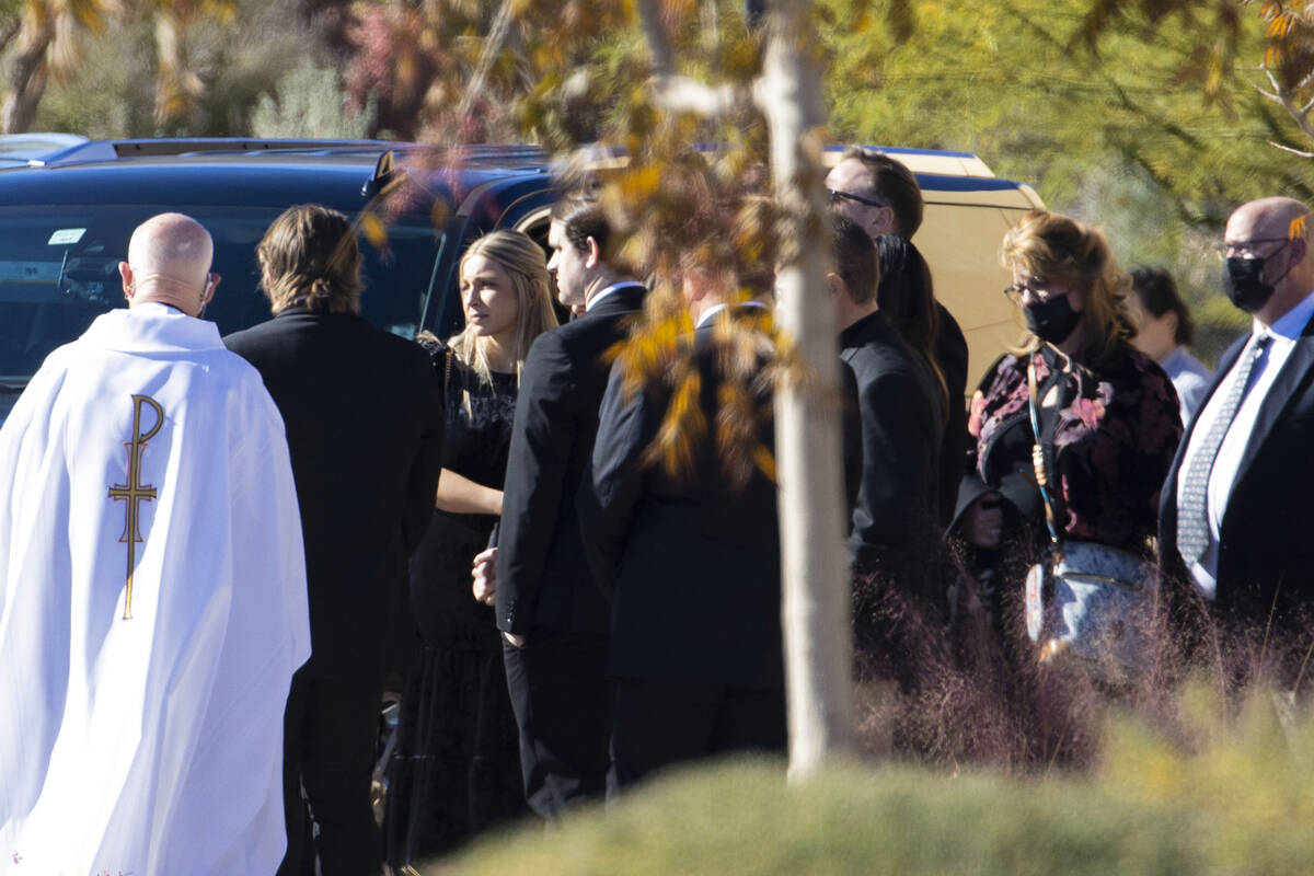 Mourners leave Holy Spirit Catholic Church after attending Dr. Kenneth Volker's funeral service ...