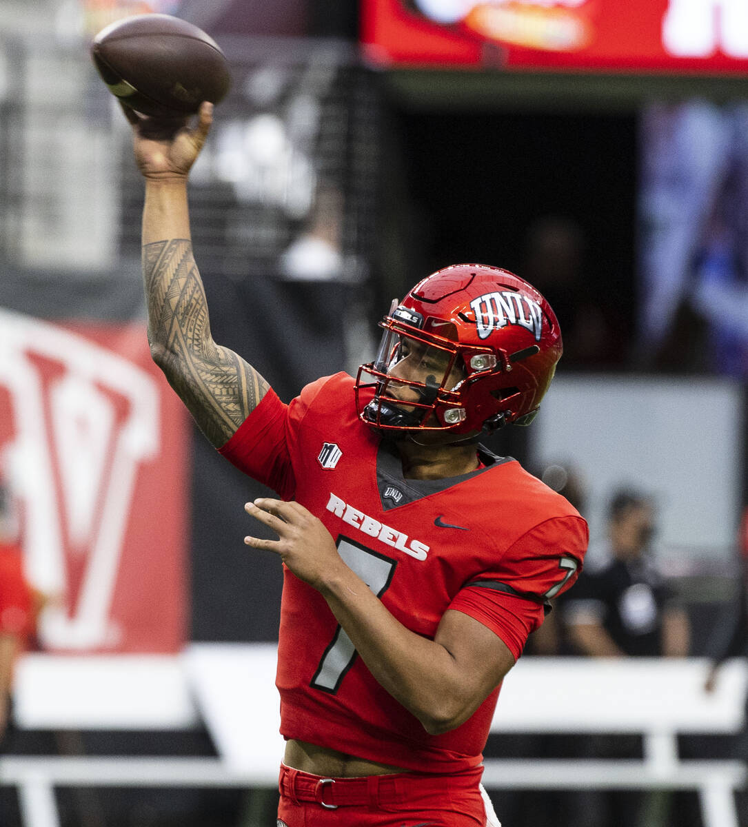 UNLV Rebels quarterback Cameron Friel (7) throws the ball as he warms up before an NCAA footbal ...