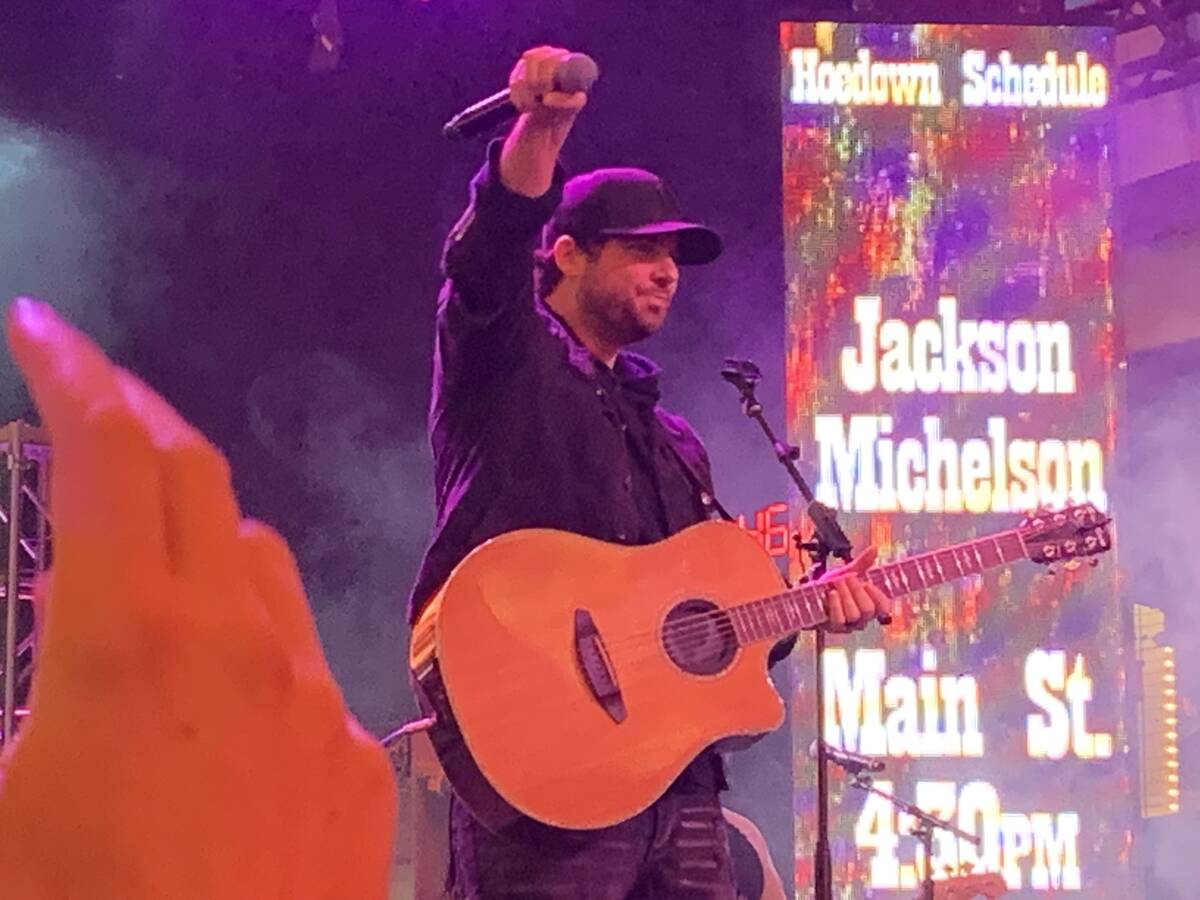 Jackson Michelson plays to the crowd at the Downtown Hoedown prior to the 2019 Wrangler Nationa ...