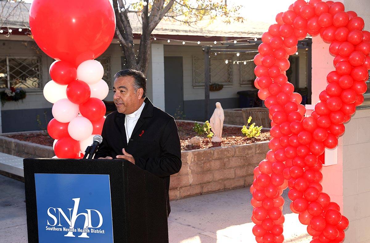 Father Rafael Pereira talks during the grand opening of the Southern Nevada Health District Sex ...