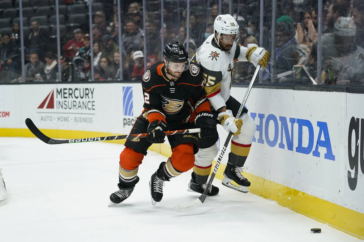 Vegas Golden Knights' Keegan Kolesar, right, and Anaheim Ducks' Kevin Shattenkirk chase the puc ...