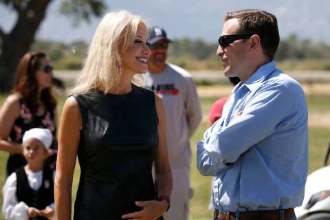 Kellyanne Conway talks to Adam Laxalt at the 4th annual Basque Fry in Gardnerville, Nev., on Sa ...