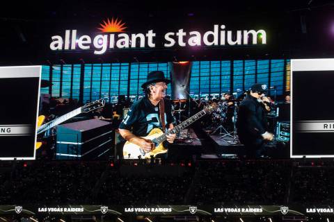 Musician and Las Vegas resident Carlos Santana performs at halftime during an NFL preseason foo ...