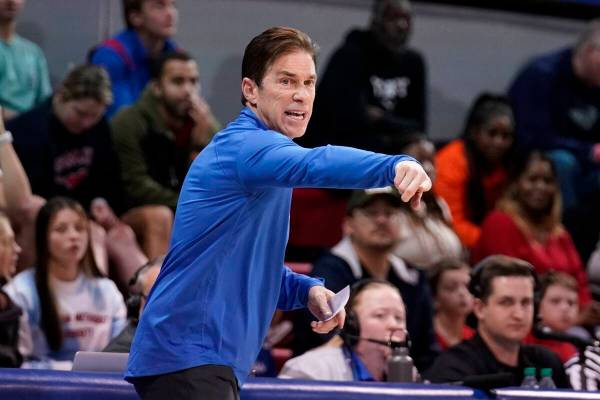 SMU head coach Tim Jankovich directs his team in the first half of an NCAA college basketball g ...