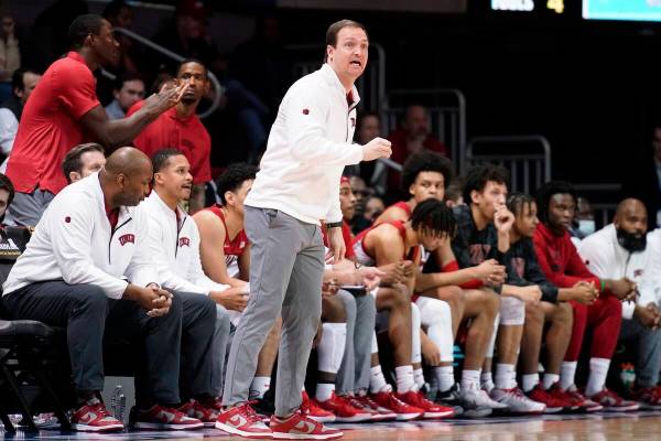 UNLV head coach Kevin Kruger directs his team in the first half of an NCAA college basketball g ...