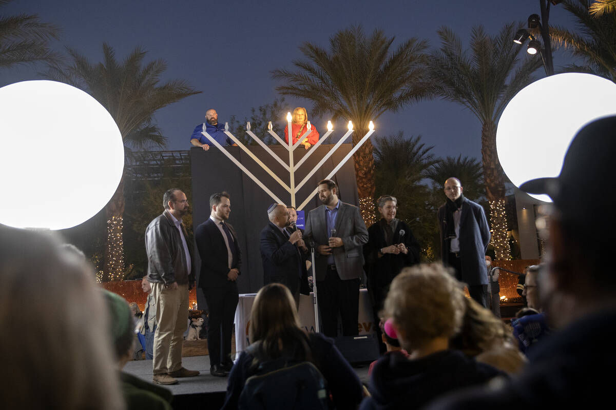 Local rabbis gather on state to light the menorah for the fourth night of Hanukkah celebration ...