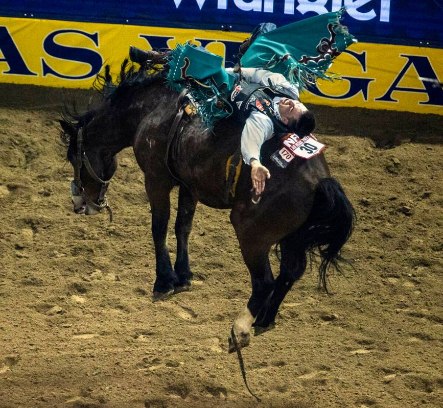 Bareback Rider Jess Pope of Waverly, KS., rides Night Crawler for a first place score during th ...