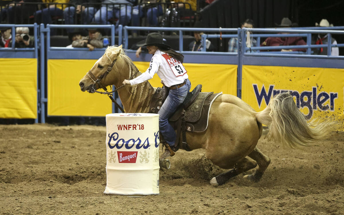 Hailey Kinsel of Cotulla, Texas (53) competes in the barrel racing event during the ninth go-ro ...