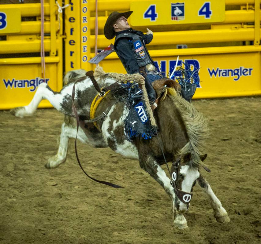 Zeke Thurston of Big Valley, AB., rides Vitlix Wyatt Earp during his Saddle Bronc Riding tie f ...