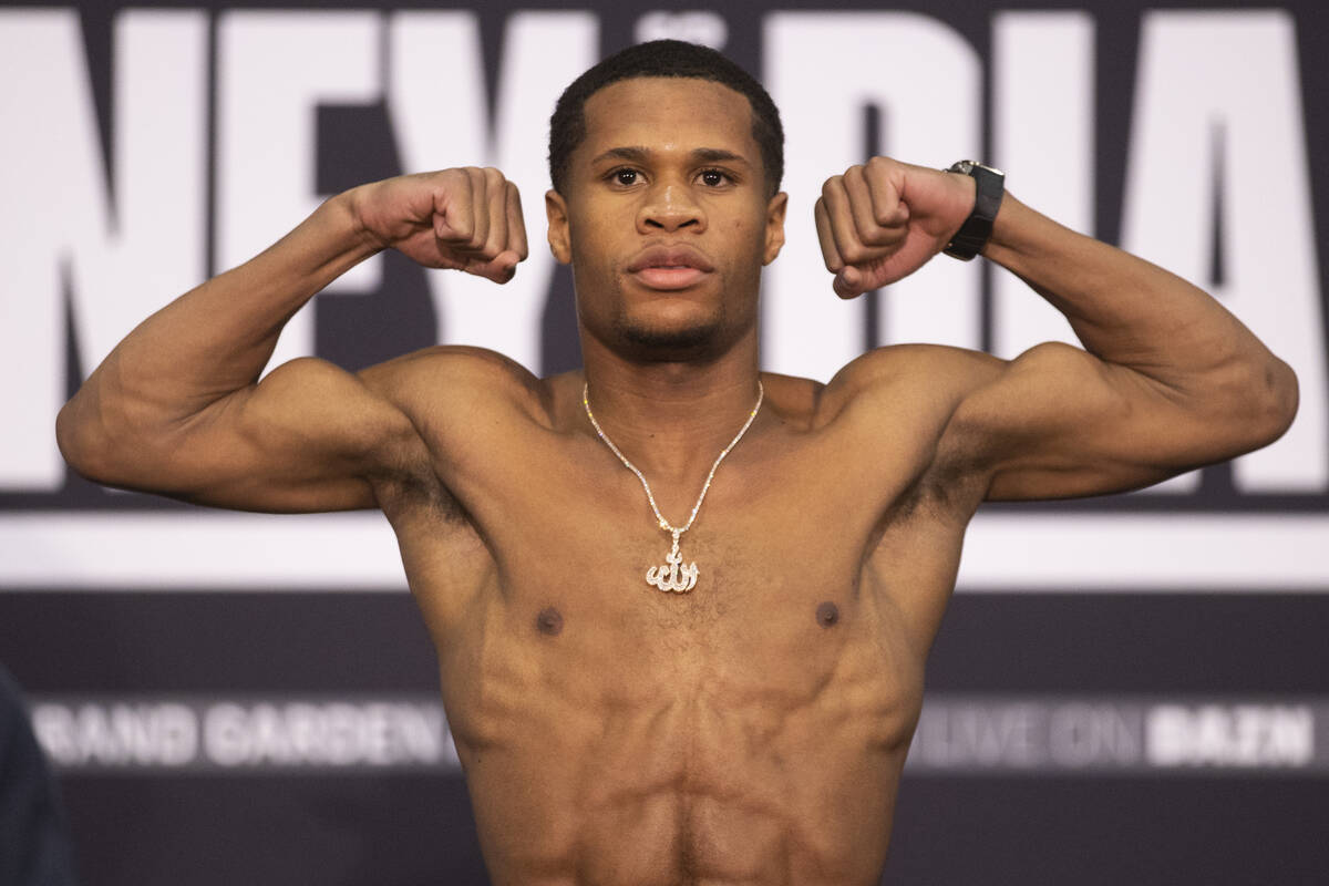 Devin Haney poses during a weigh-in event at the MGM Grand Garden Arena in Las Vegas, Friday, D ...