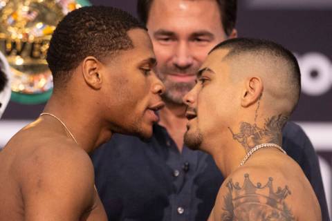 Devin Haney, left, and Joseph Diaz Jr. face off during a weigh-in event at the MGM Grand Garden ...