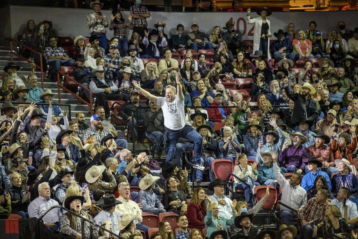 Sports entertainer Cameron Hughes pumps up the crowd during the Day 2 of the Wrangler National ...