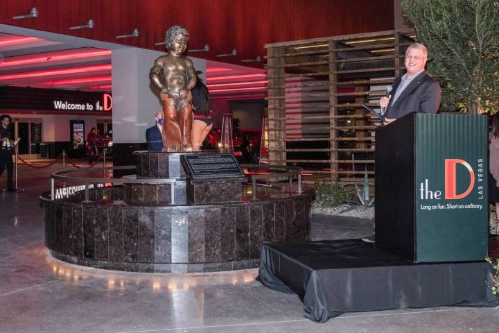 Derek Stevens, right, is shown next to the fabled Manneken Pis statue at the D Las Vegas on Thu ...