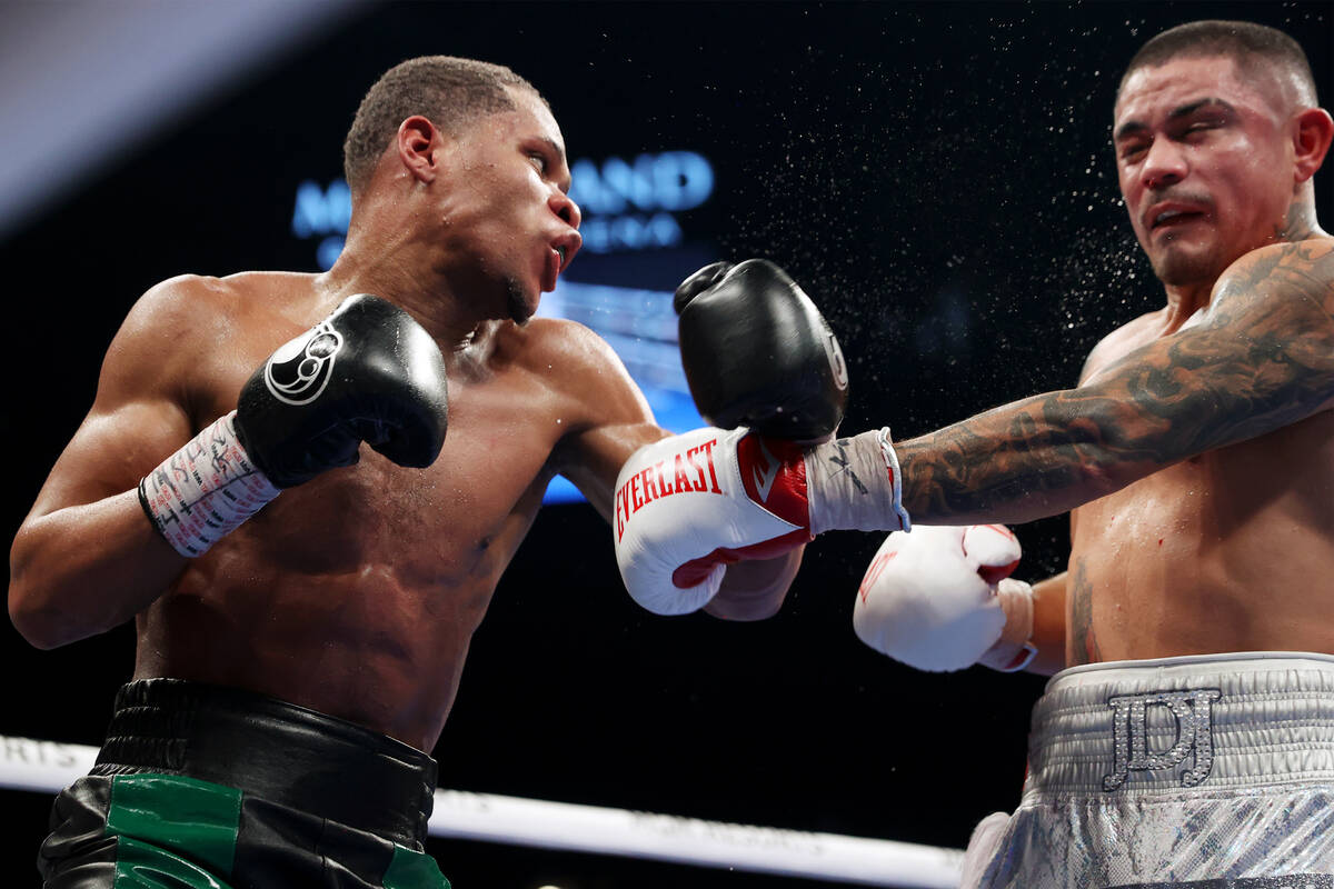 Devin Haney, left, connects a punch against Joseph Diaz Jr. in the 11th round of a WBC lightwei ...