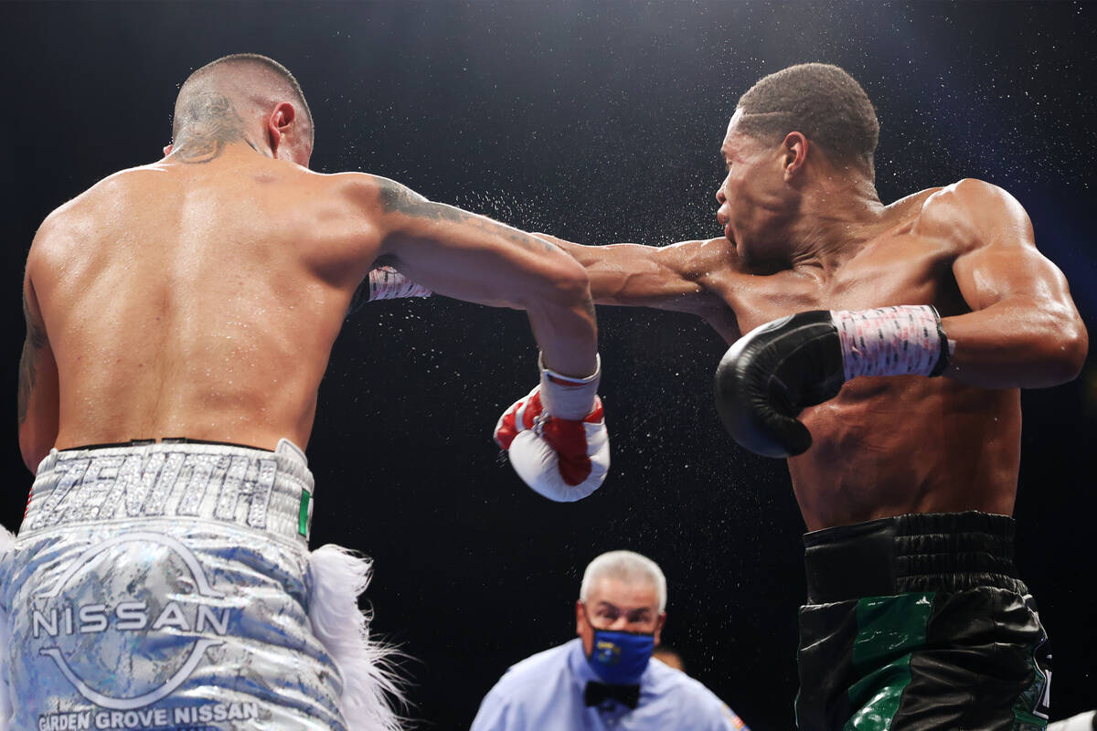 Joseph Diaz Jr., left, connects a punch against Devin Haney in the ninth round of a WBC lightwe ...