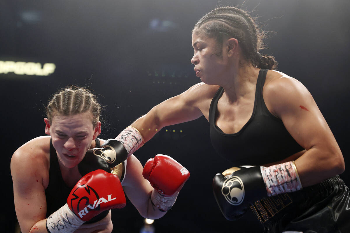 Jessica McCaskill, right, connects with a punch against Kandi Wyatt during the sixth round of a ...