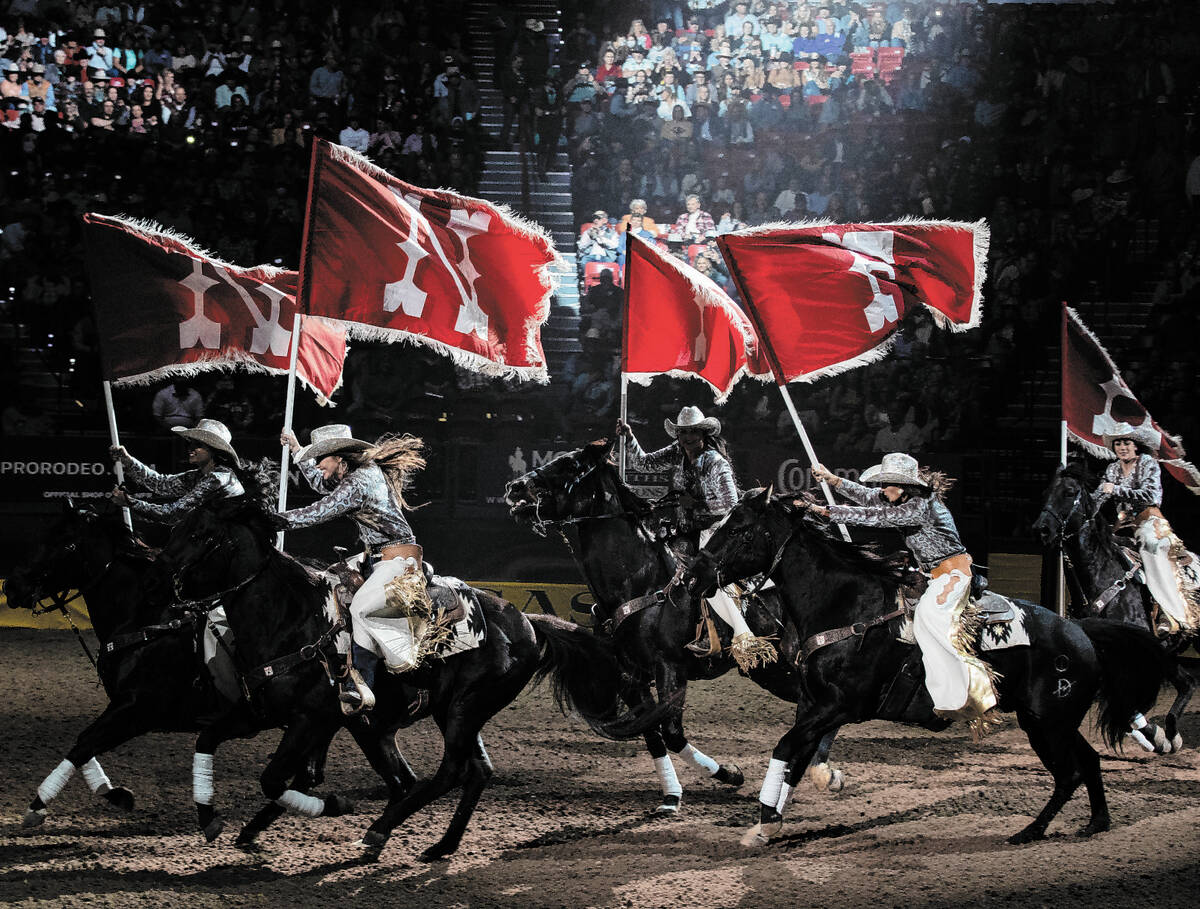 Opening girl riders during the fourth round of the Wrangler National Finals Rodeo at the Thomas ...