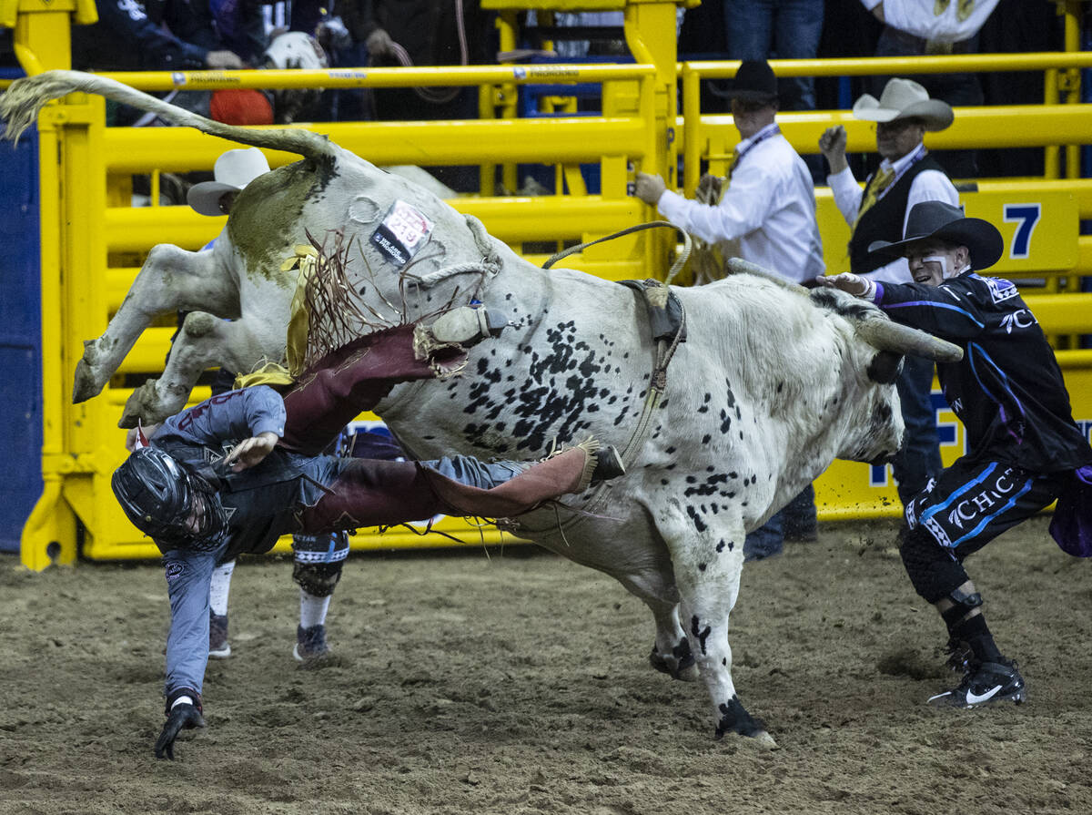 Dustin Boquet of Bourg, La., thrown from rides Hous Bad News in Bull Riding during the fourth r ...