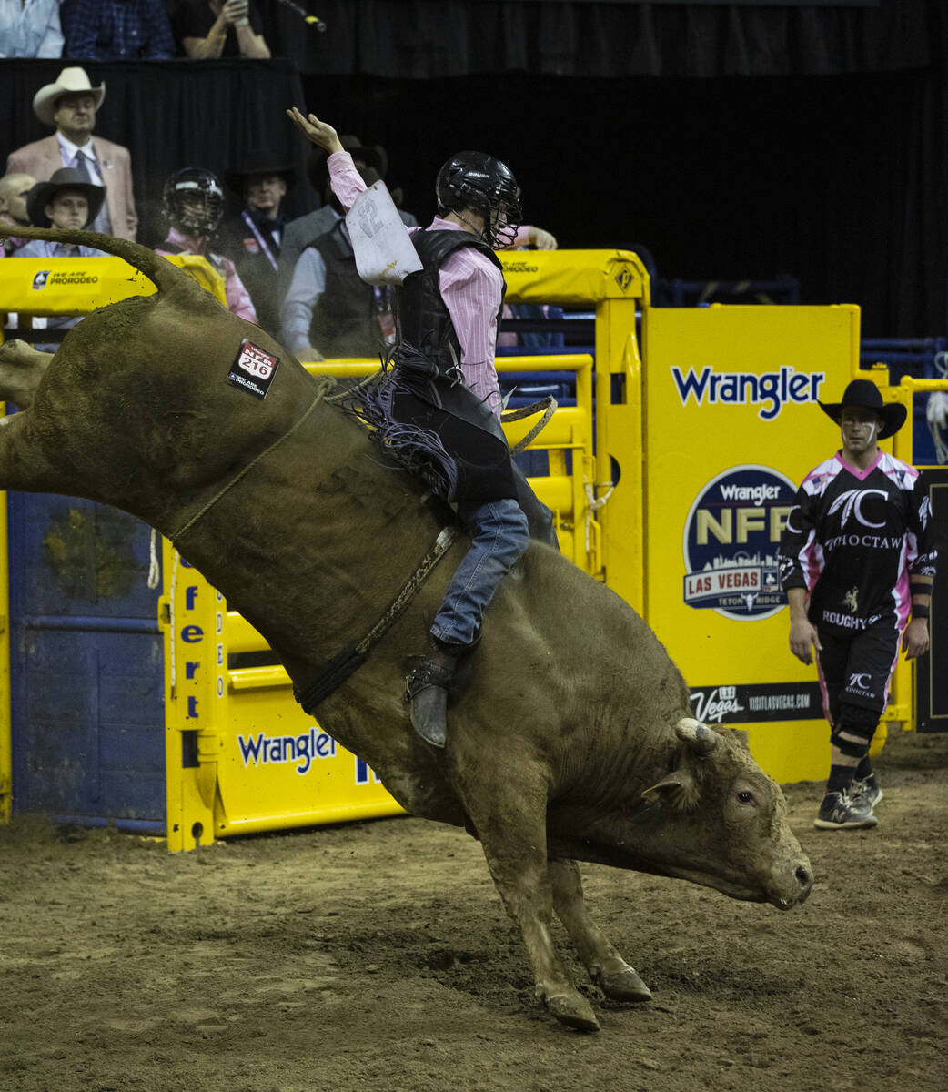 Creek Young of Rogersville, Mont., rides CliffHanger during the fifth round of the Wrangler Nat ...