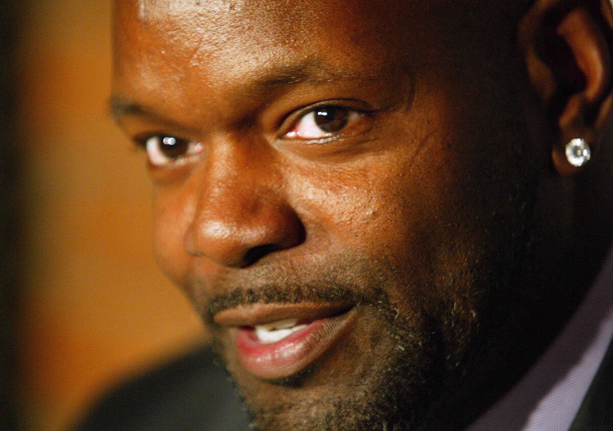 Emmitt Smith, the NFL's leading career rusher, talks with the media on March 13, 2003. (AP Pho ...