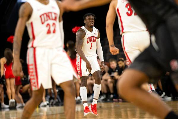 UNLV Rebels guard Michael Nuga (1) celebrates after shooting a three-pointer during the second ...