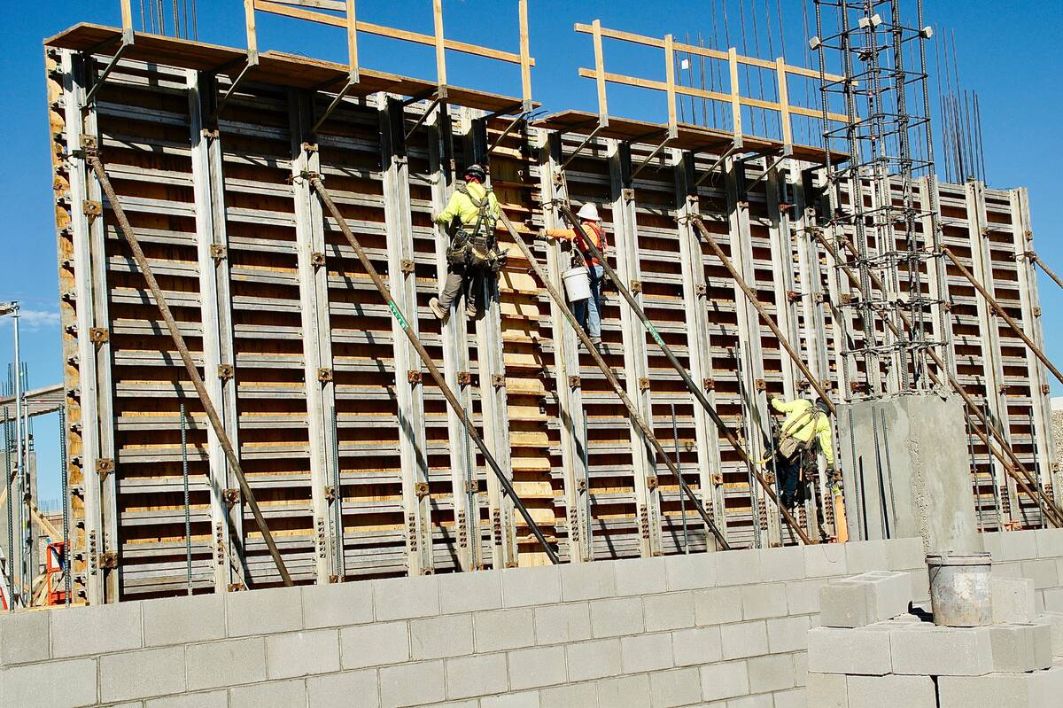 Construction workers are shown erecting shearing walls at Centennial Subaru. (Centennial Subaru)