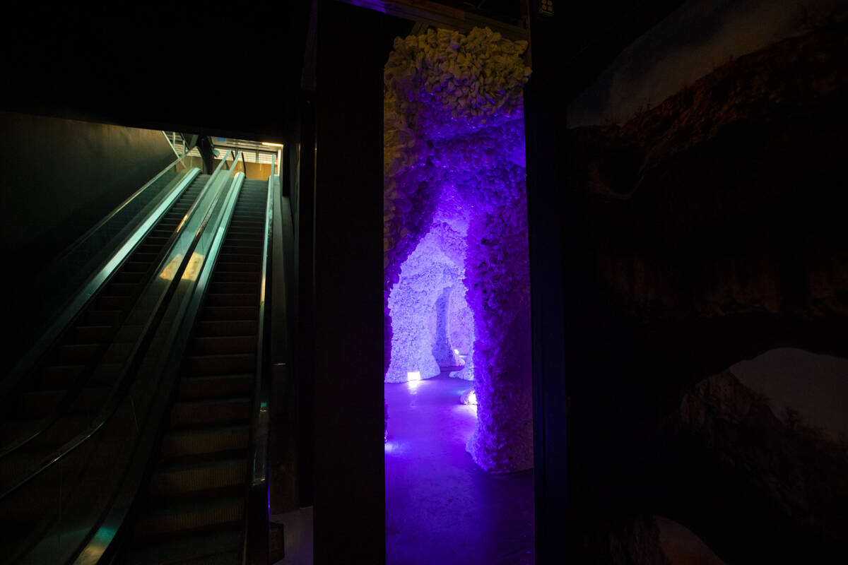 An escalator leads visitors down to the rooms of Arcadia Earth, an immersive experience highlig ...
