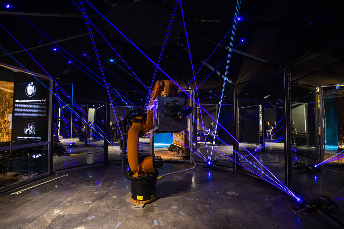 Lasers are seen alongside an industrial machine during a tour of Arcadia Earth, an immersive ex ...