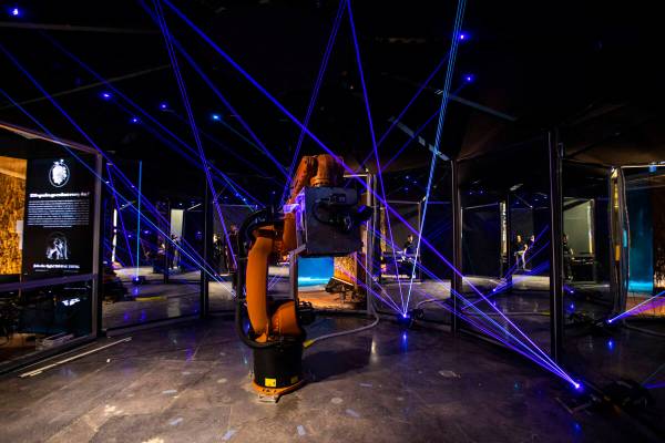 Lasers are seen alongside an industrial machine during a tour of Arcadia Earth, an immersive ex ...