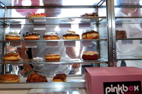 Customers at Pinkbox Doughnuts lined up for purchases on National Doughnut Day, June 7, 2019, i ...