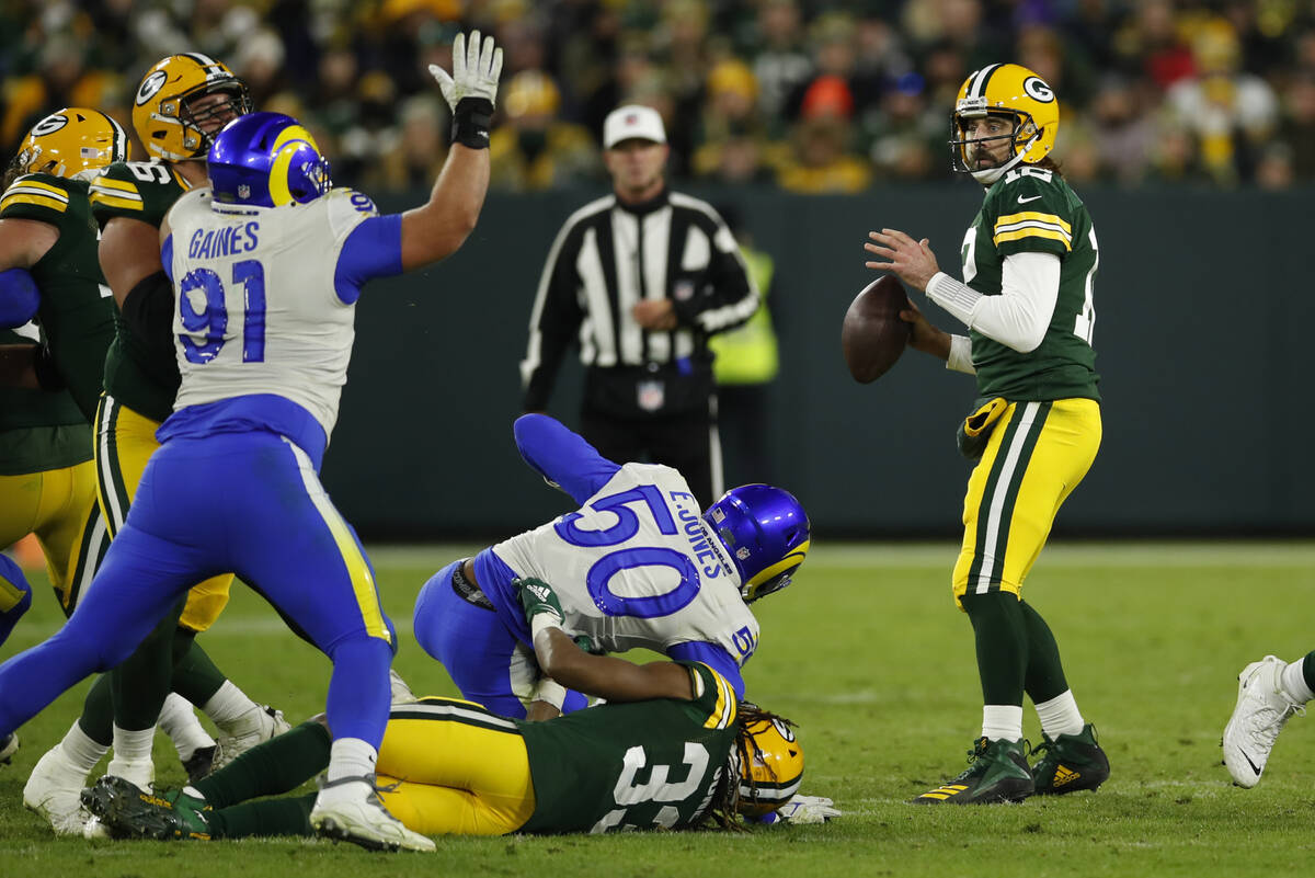 Green Bay Packers quarterback Aaron Rodgers throws a pass during an NFL football game against t ...
