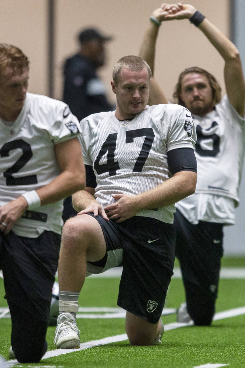 Raiders long snapper Trent Sieg (47) stretches during practice at Raiders headquarters at the I ...