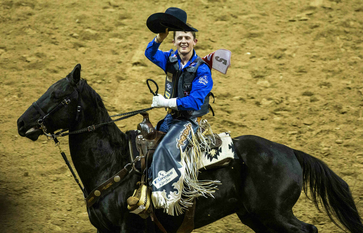 Stetson Wright of Milford, Utah, salutes the crowd after taking first place atop of Holy Holly ...