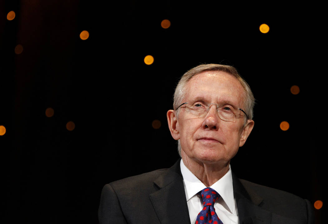 Sen. Harry Reid answers questions during the Netroots Nation convention at the Rio in Las Vegas ...