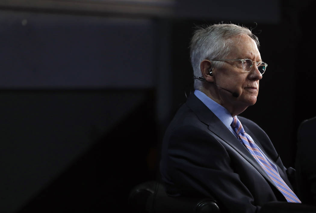 Sen. Harry Reid is interviewed during the final day of the Democratic National Convention in Ph ...